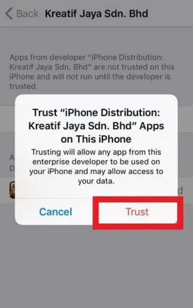Kotak konfirmasi Trust untuk aplikasi Kreatif Jaya Sdn. Bhd dengan tombol merah Trust disorot